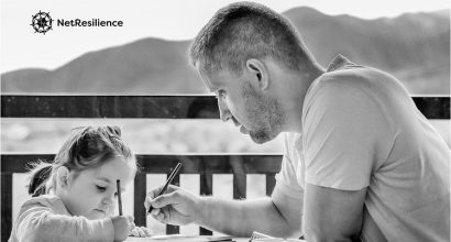 Father and daughter drawing together